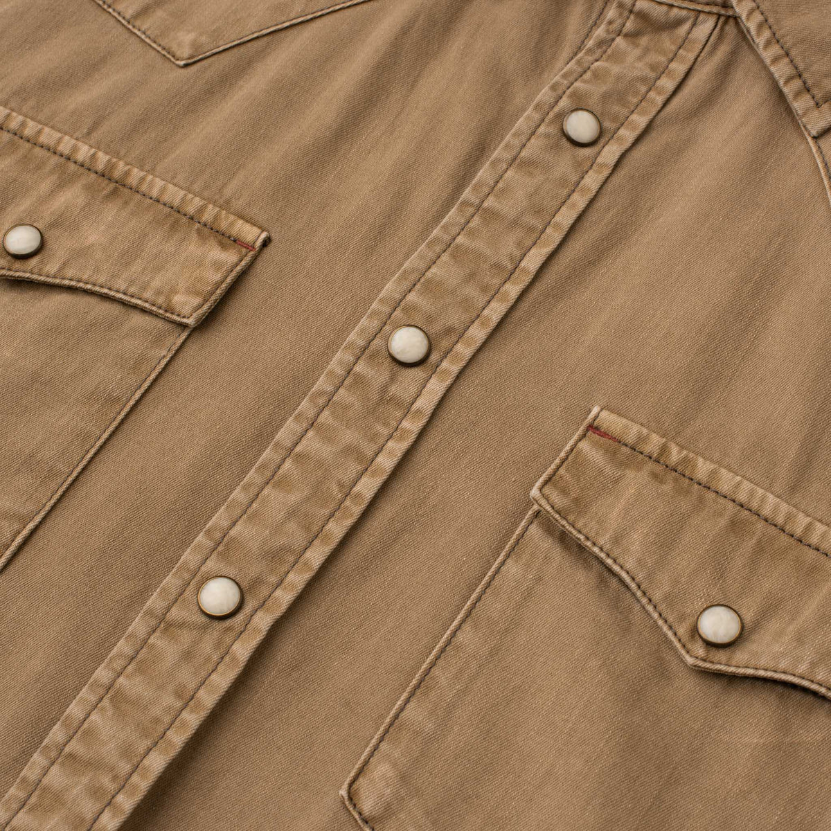 Close-up of men's Bisley Western shirt in solid tan with pearl snaps