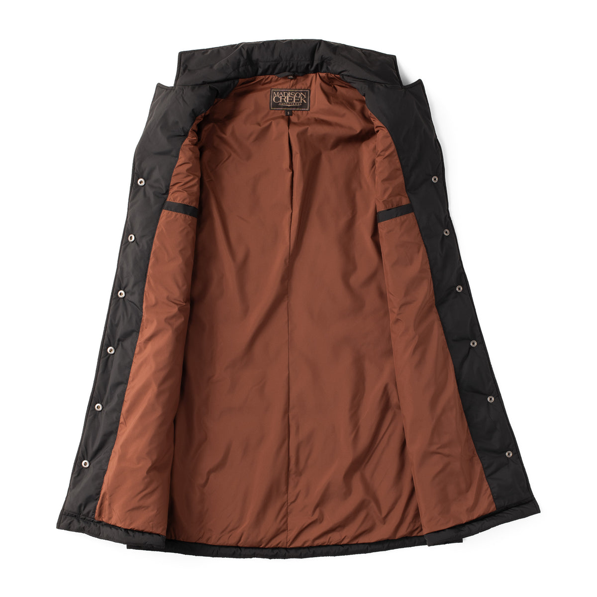 Interior view of the Cascade long women&#39;s nylon vest in black, featuring contrast lining and interior welt pockets.